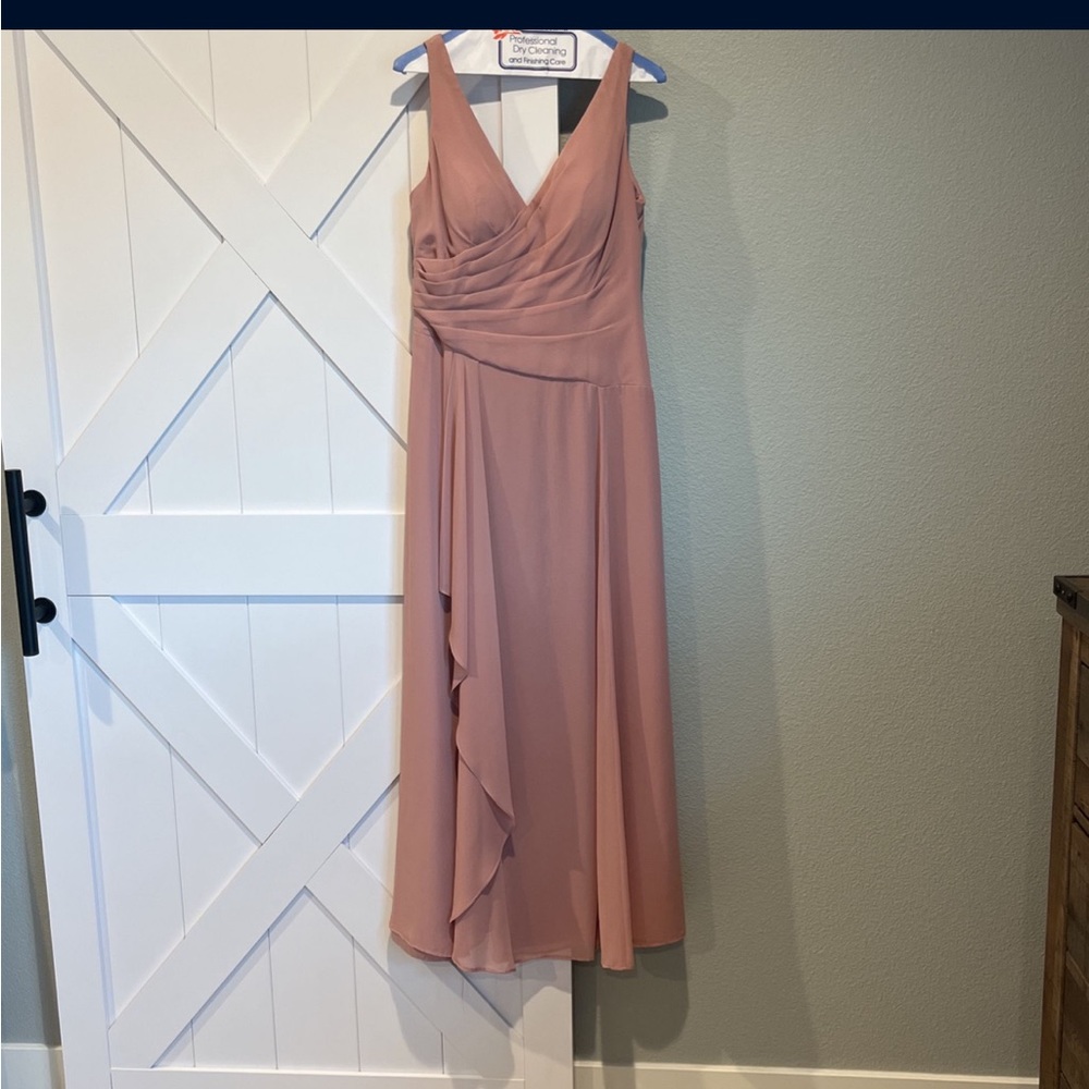 Worn once for a wedding, professionally cleaned after. No stains rips or tears.